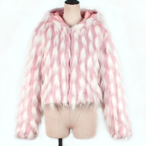 Detailed macro view of pink and white faux fur texture on short hooded coat with plush lining