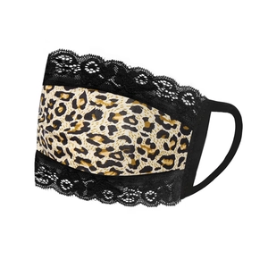 Detail of leopard print mask with black lace trim and elastic ear loops for summer