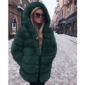 Detailed view of dark green faux fur hooded coat with horizontal layered stitching detail