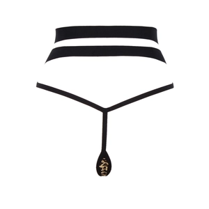 Détail macro d'un string T-back noir sexy à taille haute avec tissu à imprimé léopard