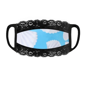 Detail of light blue sun protection mask with white shell patterns and black lace trim