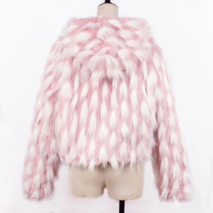 Close-up of pink and white striped faux fur hoodie with thick textured long-pile fabric