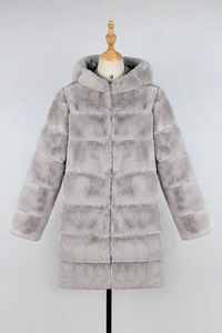 Detail of grey faux fur coat featuring horizontal tiered texture and cozy windproof hood