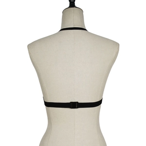 Detail showing adjustable black elastic straps and buckles on stylish lace lingerie top
