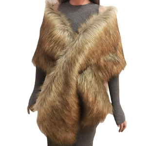 Tan faux fur shawl wrap with cross-over design styled over a dress for women