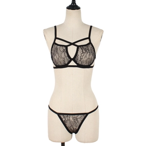 Elegant black lace lingerie set with strappy floral bralette and matching thong
