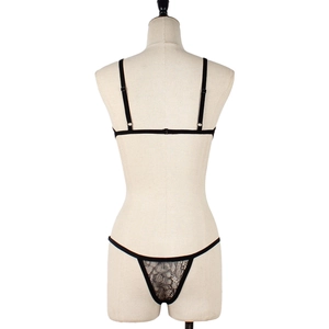Detailed back view of sexy black lace lingerie set with floral patterns on a mannequin