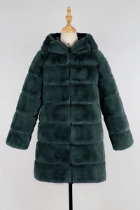 Detail of emerald green faux fur coat with horizontal striped texture and a cozy hood