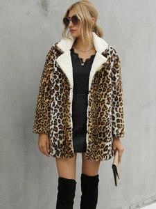 Detail of leopard print faux fur coat featuring soft white sherpa collar and cuffs