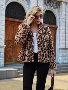 Detail of faux fur leopard print jacket texture and notch lapel for women