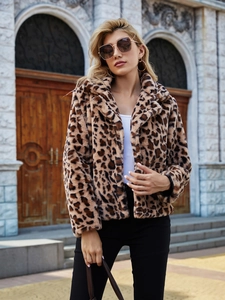 Detail view of the plush leopard print faux fur coat with retro wide lapels