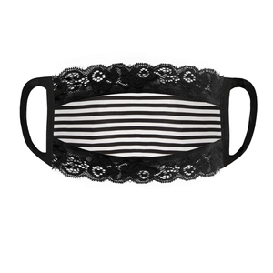 Detail of washable lace face mask featuring black and white stripes and elegant lace trim