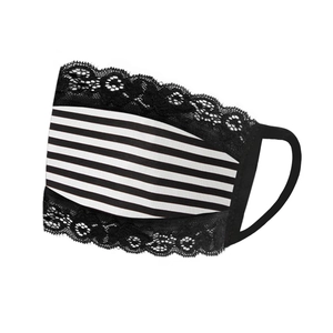Detailed shot of breathable black and white striped lace face mask with elastic ear loops
