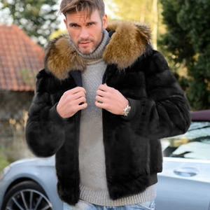 Men's winter black faux fur jacket with large brown fur hood in an outdoor setting