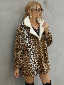 Detail of leopard print faux fur coat featuring a soft white fleece collar texture