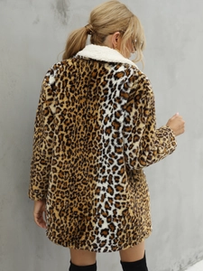 Back view of leopard print faux fur coat with a cream shearling collar detail