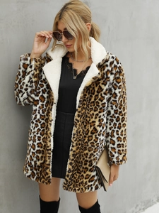 Detail showing plush leopard print faux fur coat with warm white shearling collar and lapel