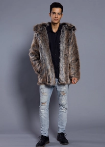 Detail of the men's long faux fur coat featuring a large hood and brown grey mixed fur texture