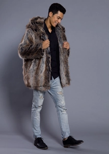 Detailed macro view of the thick faux fur texture and large hooded collar on the men jacket