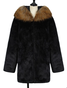 Detail of faux fur coat featuring a thick brown collar and glossy black winter fabric
