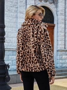Detail shot of leopard print faux fur jacket with classic notch lapel and soft texture