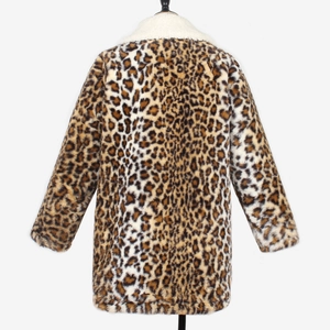Close-up of leopard print faux fur coat featuring a soft white fleece collar detail