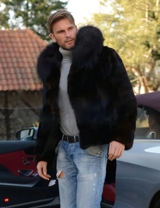 Detail of faux fox fur coat collar with luxury deep brown texture on men's winter jacket