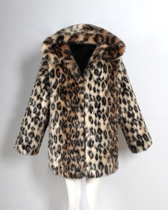 Detail of hood and texture on brown leopard print faux fur coat for winter fashion