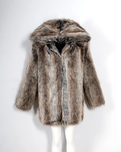 Detailed macro view of the premium faux fur texture and mixed brown tones on hooded coat