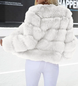 Rear view of white faux fur jacket showing fluffy layered texture and horizontal stitching