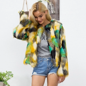 Faux fur jacket with colorful yellow, green, and black patchwork in short cropped style