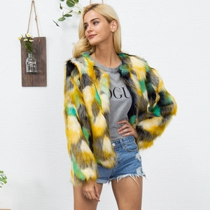 Short faux fur coat with colorful geometric pattern in yellow green and white