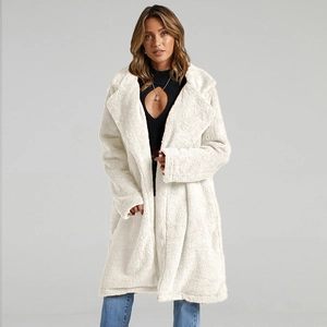 Women's white oversized plush teddy coat with large lapels and fluffy faux fur texture