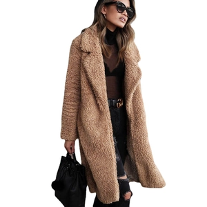 Women's brown faux fur teddy coat with lapel collar and mid-length oversized fit
