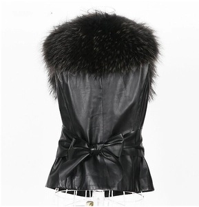 Back view of a black faux leather vest with large fur collar and elegant waist bow tie