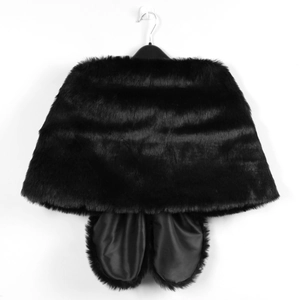 Detail view of the black faux fur shawl showing soft dense pile and satin lining texture