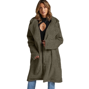 Deep olive green teddy fur coat with large lapels and plush texture for winter