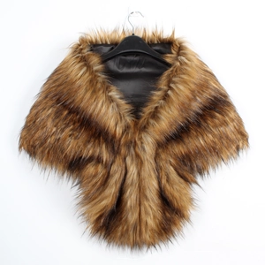 Close-up of brown faux fur shawl featuring soft long fibers and a smooth black satin lining