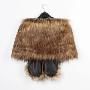 Close-up of thick brown faux fur shawl featuring dense texture and built-in hand pockets
