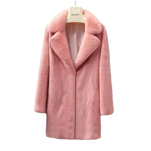 Close-up detail of soft pink faux fur coat with notched lapel and plush texture