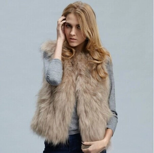 Close-up of beige faux fox fur vest showing soft texture and premium fluffy material