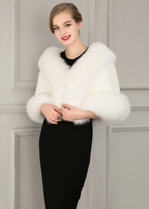 Detailed view of the soft white faux fur texture and elegant fluffy bridal stole