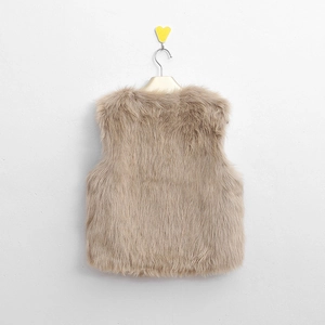 Close-up of soft fluffy faux fox fur texture on a light khaki short vest for children