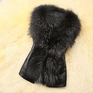 Women's black faux fur vest with shiny leather patchwork, sleeveless slim fit style