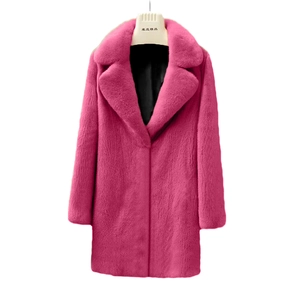 Detail of flamingo pink faux fur coat featuring wide lapels and black contrast lining