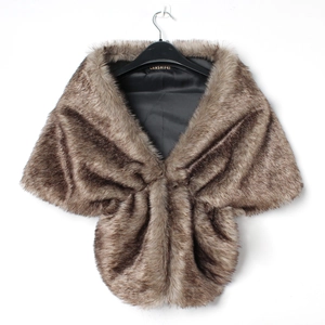 Detail of faux fur shawl with plush brown texture and black satin lining on hanger
