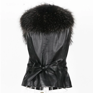 Women's slim black leather vest with faux raccoon fur collar and back bow detail