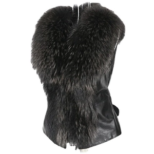 Slim fit black faux leather vest for women featuring a large fluffy faux fur collar