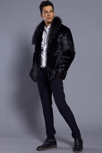 Detailed view of luxury men's black faux fur coat with plush collar and high-end texture