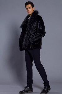Detailed view of men's black faux fur coat with thick shawl collar in luxury style